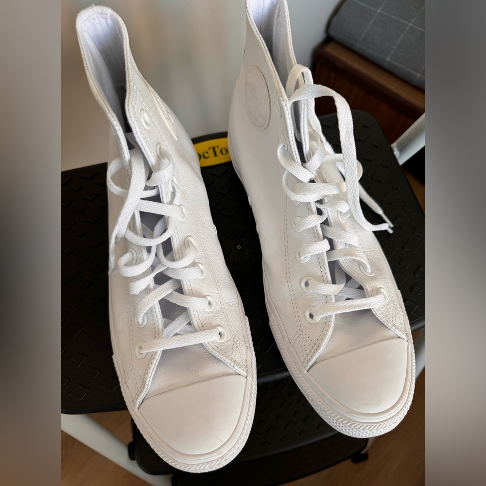 White leather All Star high tops.